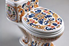 DALL·E-2025-09-02-20.59.34-A-photorealistic-close-up-of-a-white-porcelain-toilet-but-its-entire-smooth-surface-is-painted-with-ornate-azulejos-style-designs.-The-toilet-is-perf