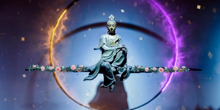 a statue of a person holding a sword