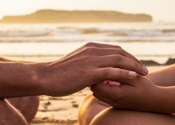 two person holding hands