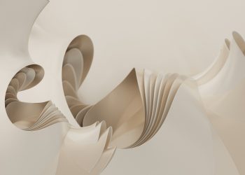 A white sculpture with a curved design on it