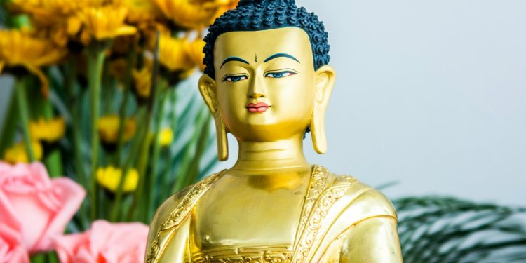 gold and silver hindu deity statue