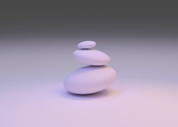 white round stone on white surface