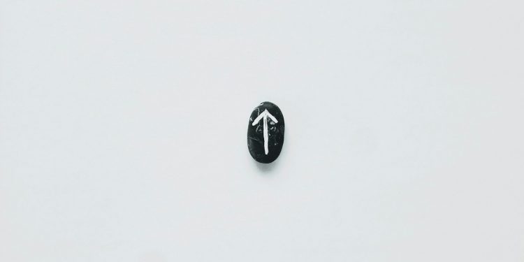 silver and black round pendant