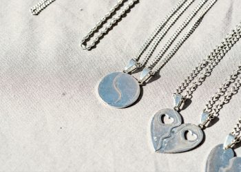 A bunch of necklaces that are sitting on a table