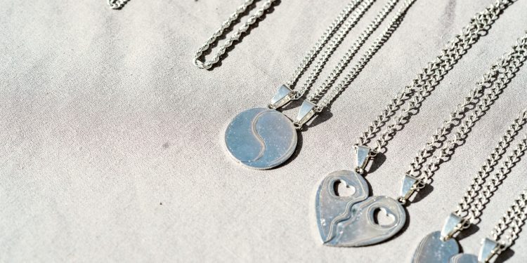 A bunch of necklaces that are sitting on a table