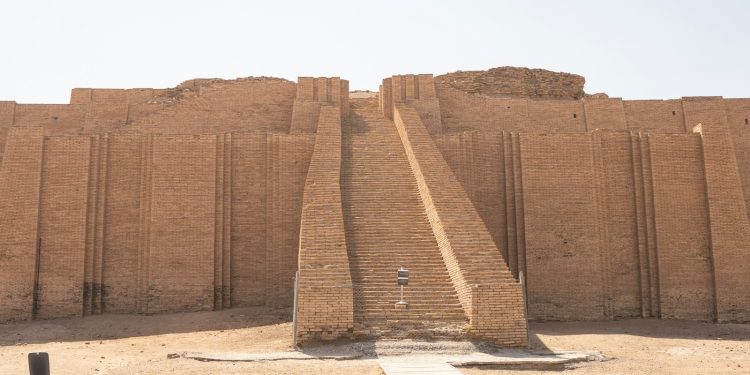 a very tall brick structure with steps leading up to it