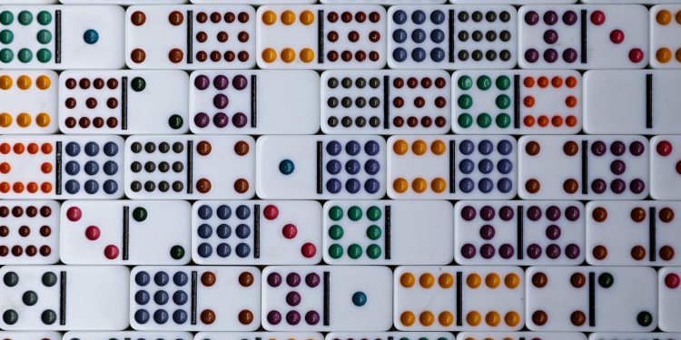 white red green and yellow multi color heart print textile