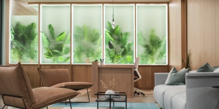 brown wooden table near white couch