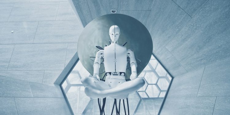 man in black jacket sitting on white chair