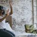Woman wearing vr headset interacting with virtual reality